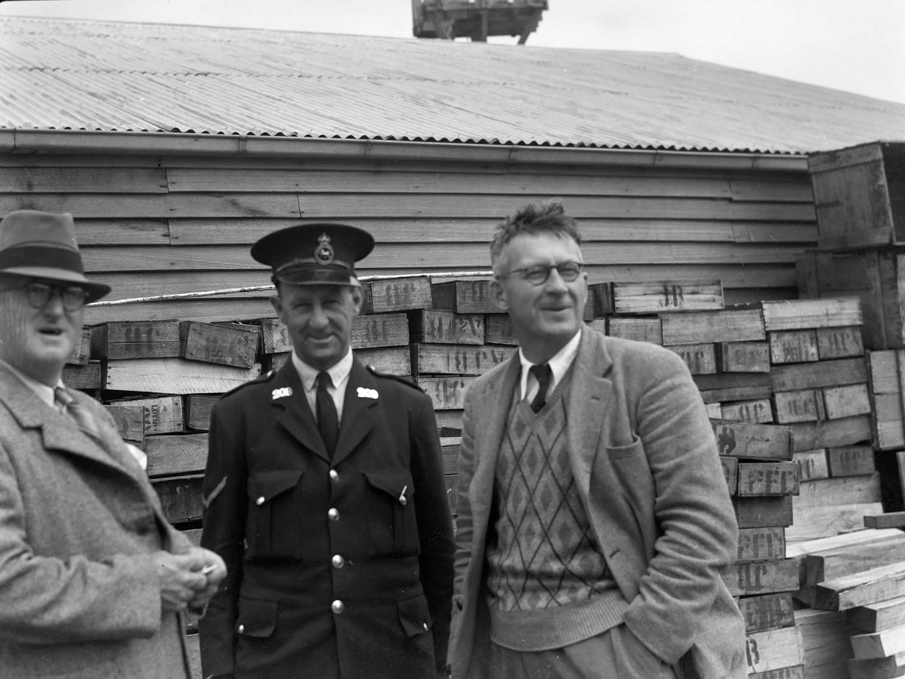 Source: Burnie Regional Museum Local policeman chatting with locals at the wharf in Stanley