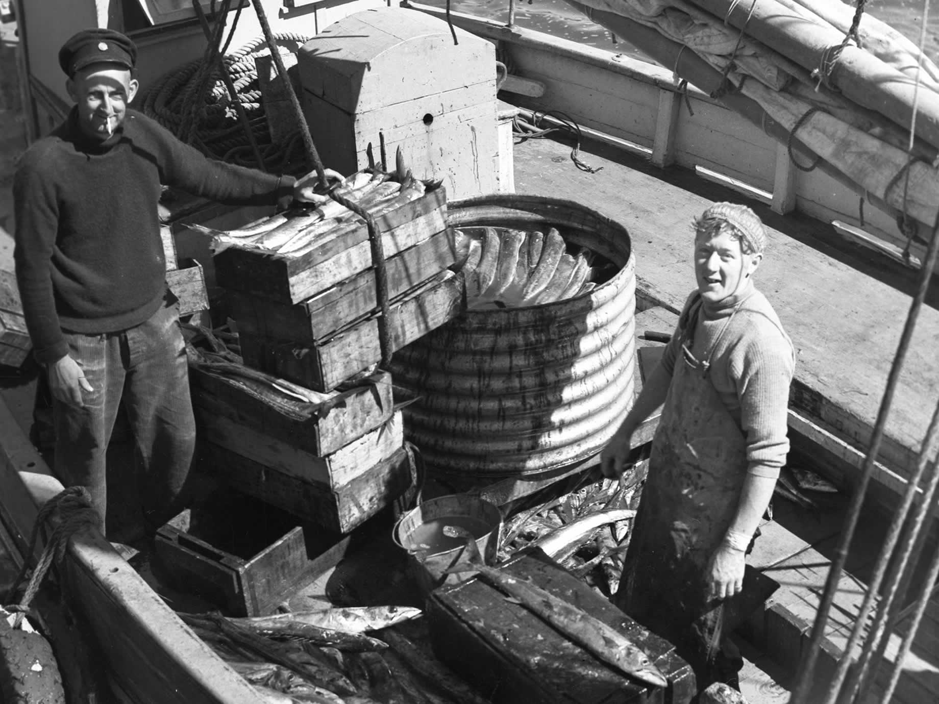 Source: Burnie Regional Museum Fishermen working on board the ‘Helen’ in the 1920s